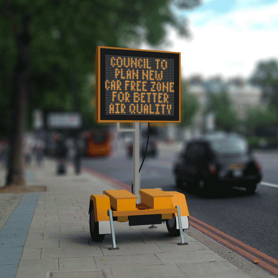 A portable electronic sign on the pavement notifying that mobile phone locations will be collected